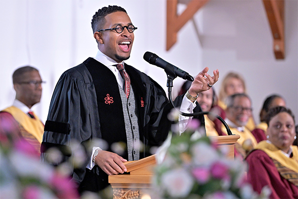 The Rev. Brandon Thomas Crowley, left, speaks during Sunday service at Myrtle Baptist Church in Newton, Mass., on Sunday, May 5, 2024. Crowley felt he was called to be a Christian pastor — a preacher of the social justice gospel. (AP Photo/Josh Reynolds)